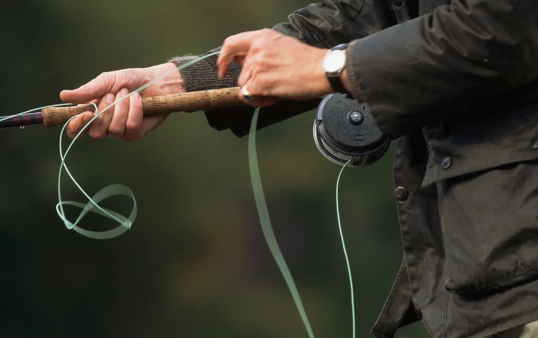 A well-maintained fishing reel, clean and ready for use.