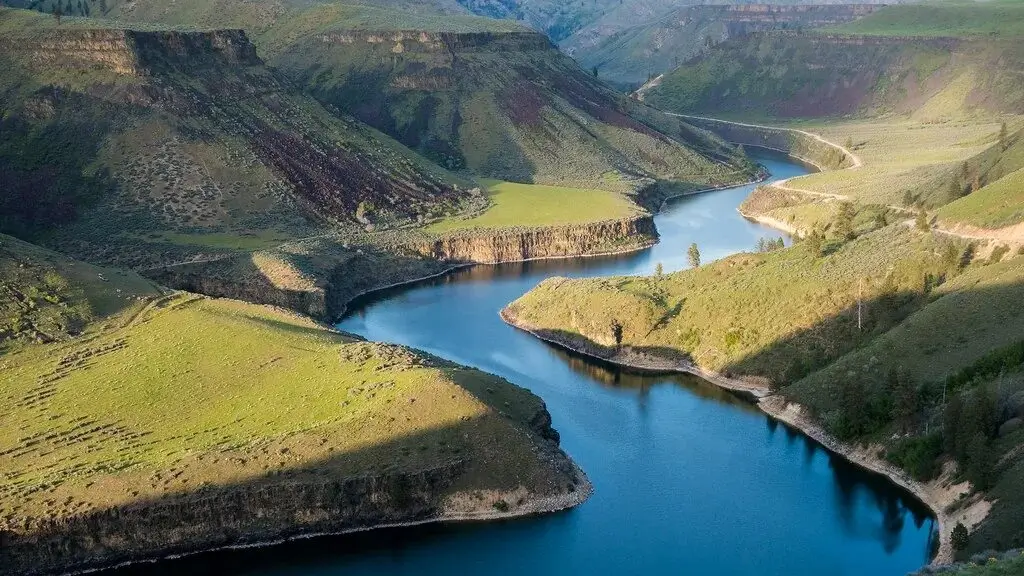 A winding river with visible currents and eddies.